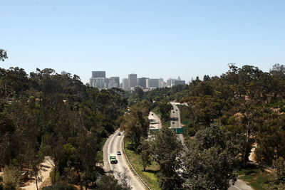 Buildings against clear sky in city