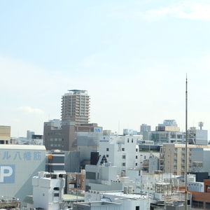 Buildings in city against sky