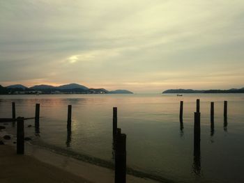 Scenic view of sea against cloudy sky