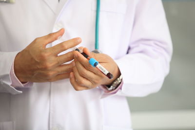 Close-up of woman holding hands