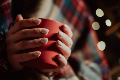 Close-up of woman holding hands