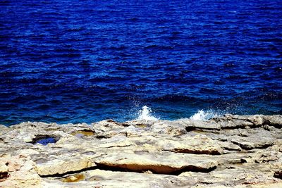 Scenic view of rocks on beach