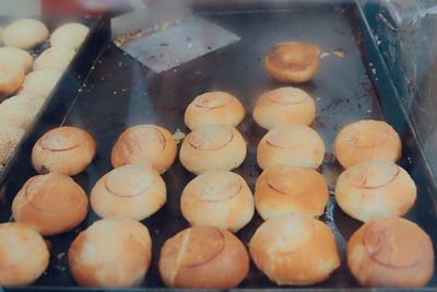 High angle view of macaroons in container