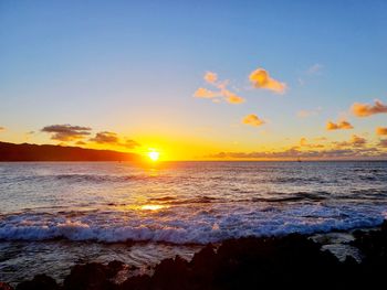 Scenic view of sea against sky during sunset