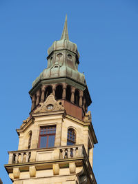 Low angle view of cathedral against clear blue sky