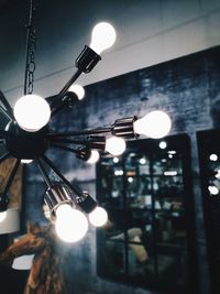 Low angle view of illuminated light bulb