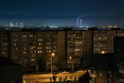 High angle view of illuminated buildings at night