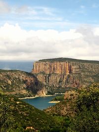 Scenic view of rock formations against sky