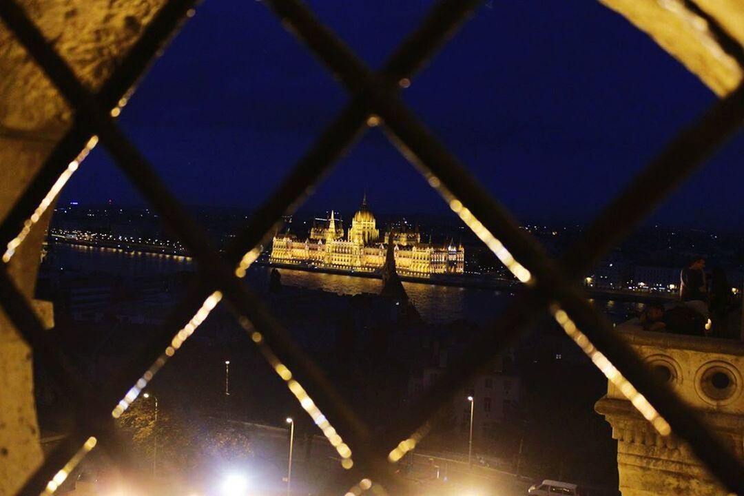 architecture, built structure, illuminated, building exterior, city, cityscape, sky, bridge - man made structure, water, metal, connection, river, reflection, night, travel destinations, no people, capital cities, famous place, outdoors, clear sky