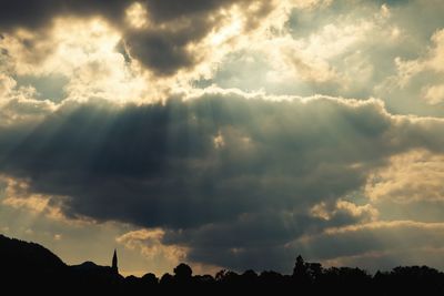 Low angle view of dramatic sky during sunset