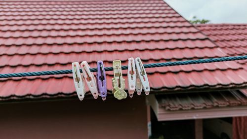 Low angle view of multi colored roof against building