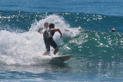 Man surfing in sea