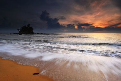 Scenic view of beach during sunset