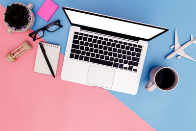 High angle view of coffee cup on table