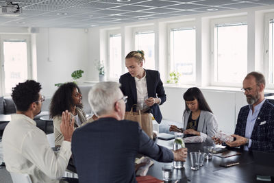 People in boardroom during business meeting