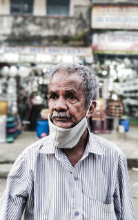 Portrait of a man in city