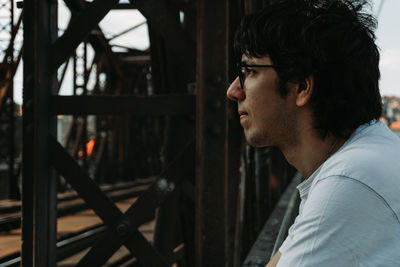 Close-up of young man looking away