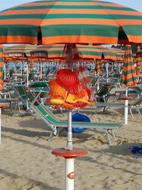 Multi colored chairs on beach