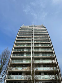 Low angle view of modern building against sky