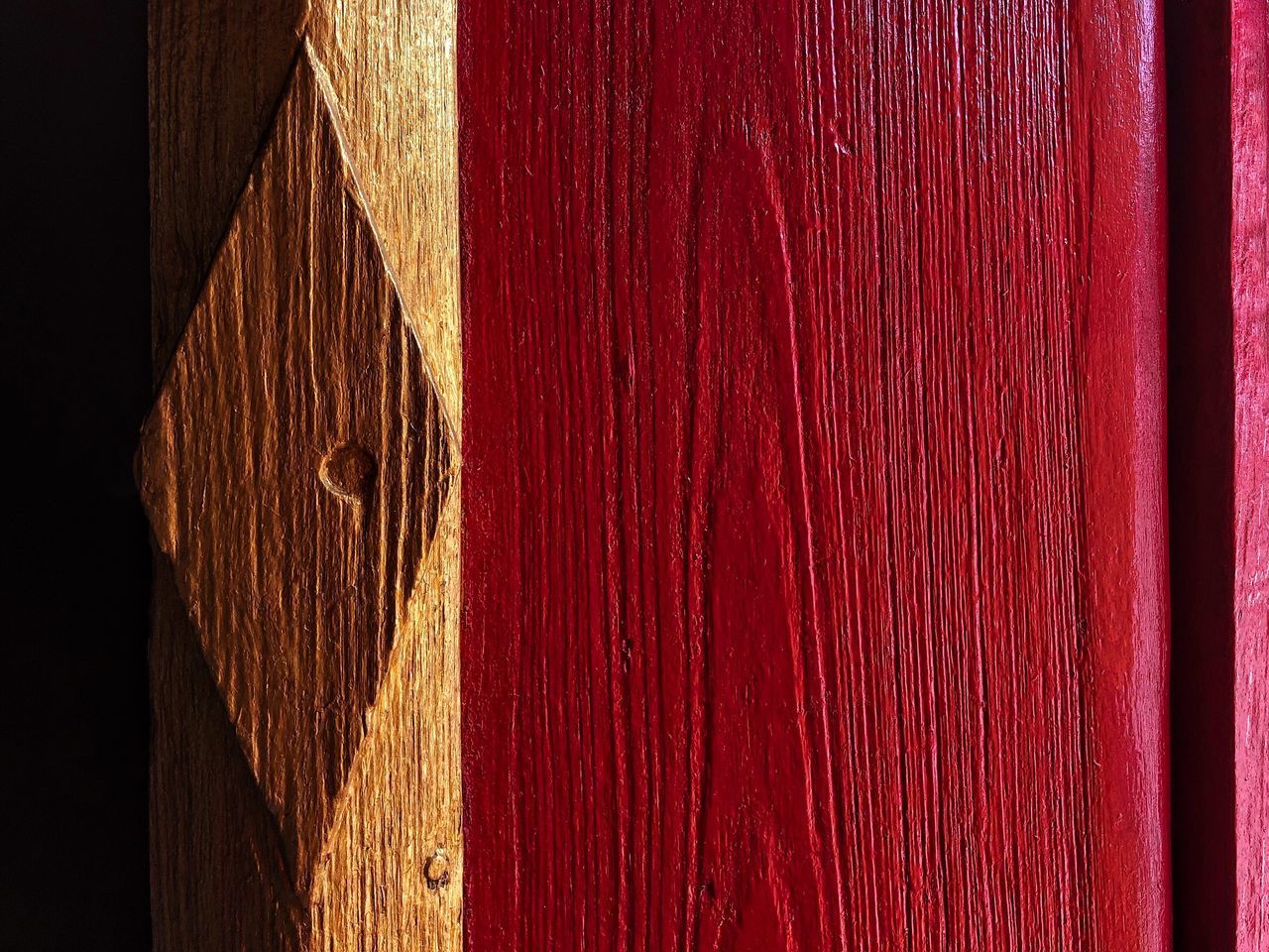 CLOSE-UP OF RED WOODEN FLOOR