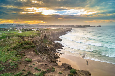 High angle view of beach against cloudy sky