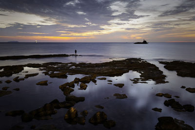 Scenic view of sea against sky during sunset