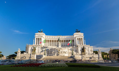 Low angle view of building against blue sky