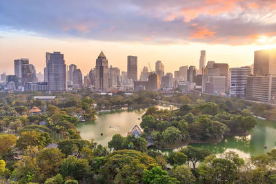 View of buildings against cloudy sky during sunset