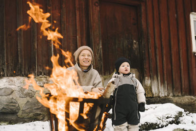 Full length of a smiling young woman in winter