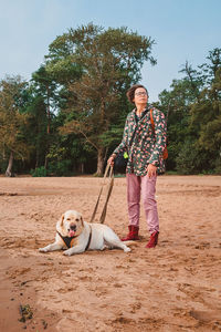 Woman with dog on street