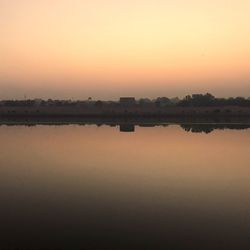 Scenic view of lake during sunset