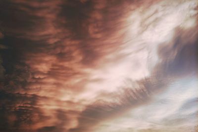 Low angle view of dramatic sky during sunset