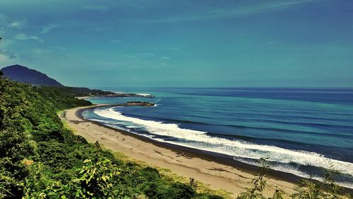 Scenic view of beach against sky