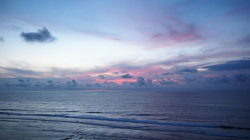 Scenic view of sea against dramatic sky