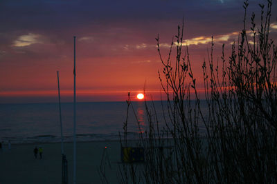 Scenic view of sea against sky at sunset