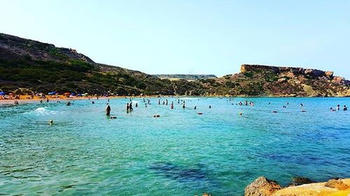 Scenic view of sea against blue sky