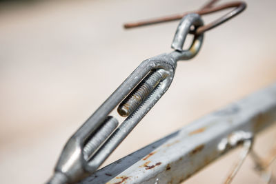 Close-up of rusty metal on table