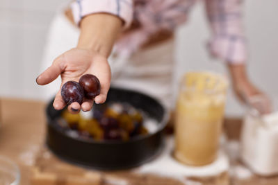 Midsection of woman preparing food