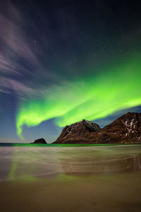 Scenic view of sea against sky at night