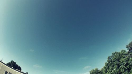 Low angle view of built structure against blue sky