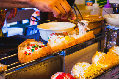 Close-up of hand holding food