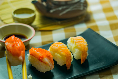 Close-up of sushi served in plate on table