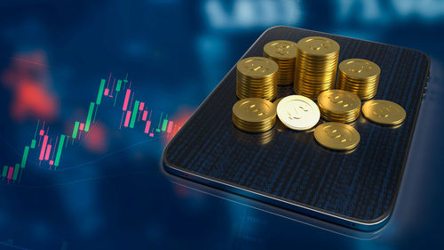High angle view of coins on table