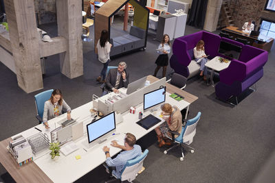 People working in big modern office