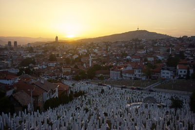 High angle view of townscape against sky during sunset