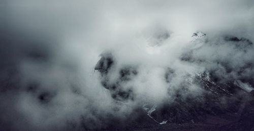 Smoke emitting from volcanic mountain