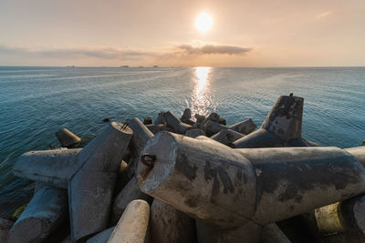 Scenic view of sea against sky during sunset