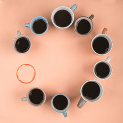 High angle view of coffee cups on table