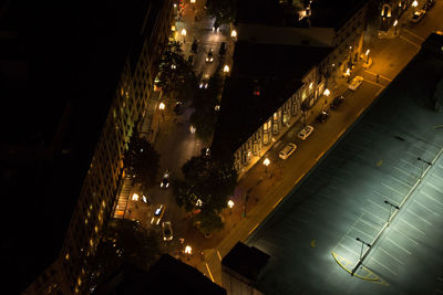 High angle view of illuminated buildings in city at night