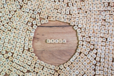 High angle view of wooden letter toy blocks on table